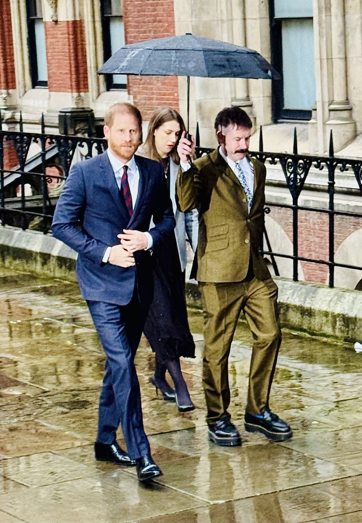 Prince Harry arrives at the Royal Courts of Justice in central London, walking past the press in wet conditions as proceedings continue in his case against Associated Newspapers Limited. The duke acknowledged photographers briefly as he entered the court.