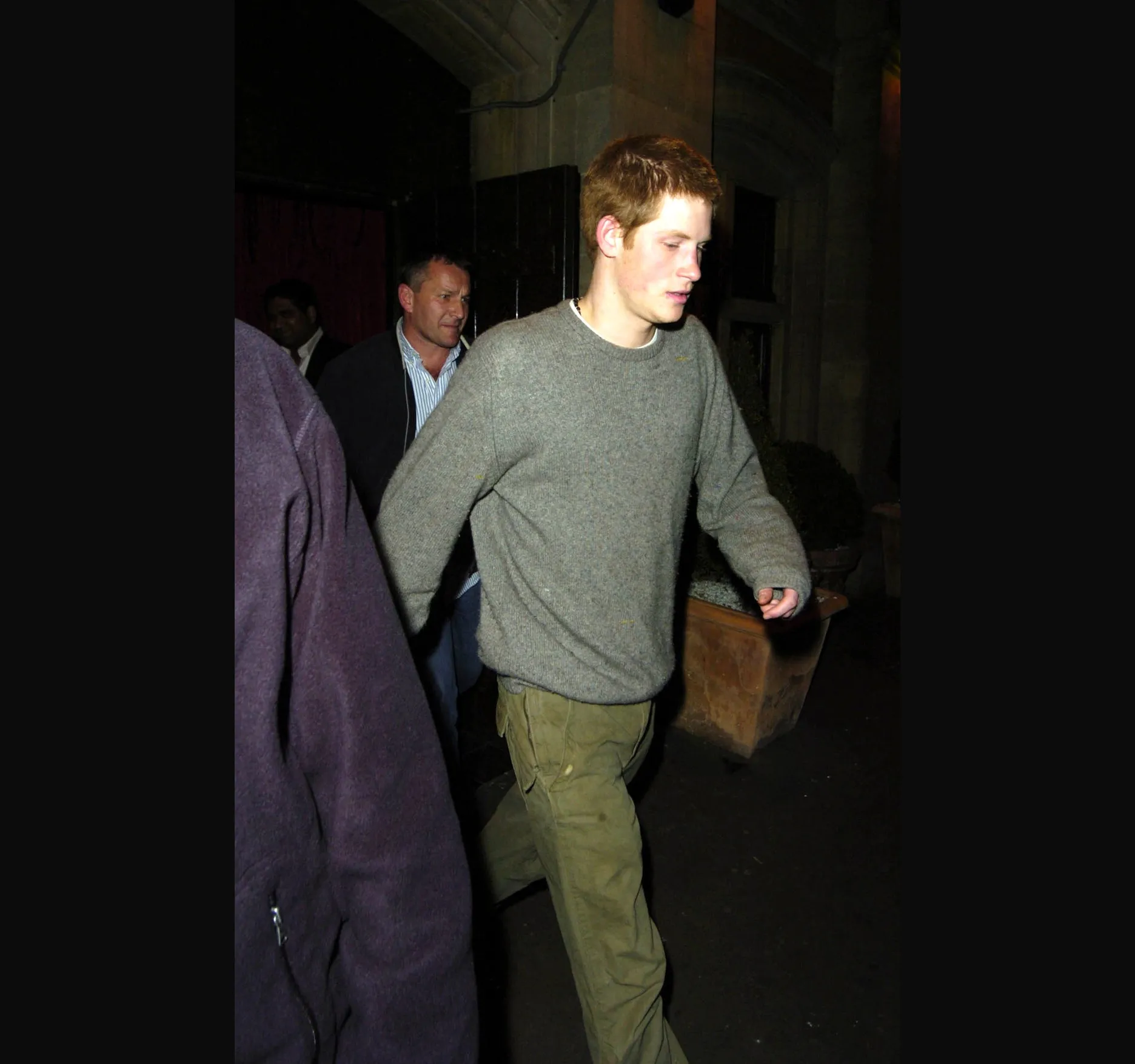 SUGAR HUT, MARCH 2005. Prince Harry, then 20, leaves the Sugar Hut in Fulham on the evening of Easter Monday, 28 March 2005.

Reports at the time said he and his brother Prince William had gone out with a group of friends over the Easter weekend, while Prince Charles was at Birkhall in Scotland. Kate Middleton, then studying with William at St Andrews, was reported to have left the venue about ten minutes after them.

Here is Harry in a grey jumper and khaki trousers, eyes ahead as he walks out into the street.