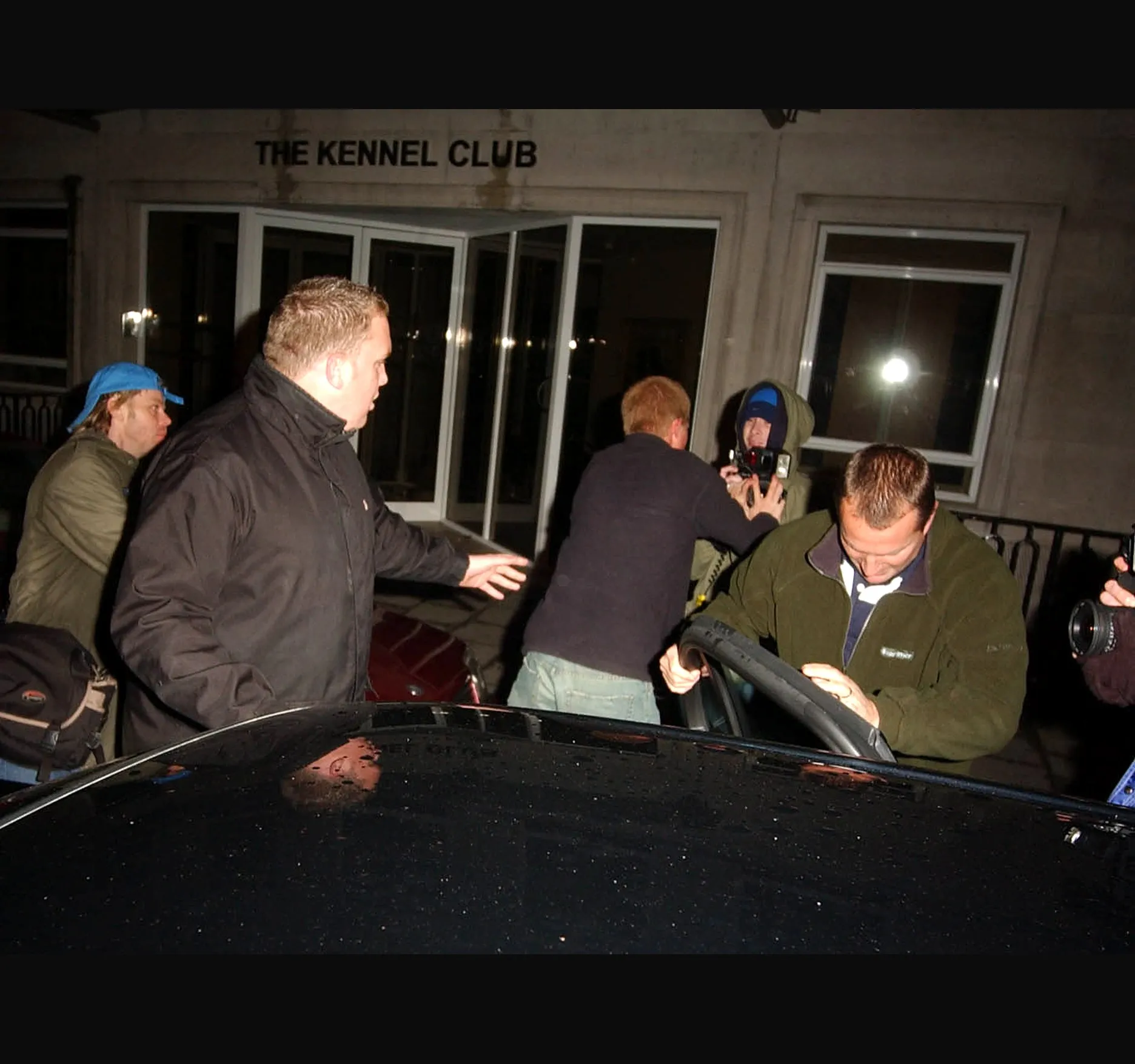 PANGAEA, OCTOBER 2004. Prince Harry, then 20, leaves Pangaea nightclub in Piccadilly in the early hours of 21 October 2004, with photographers crowded round his car.

The night was widely reported. Clarence House said the Prince was hit in the face by a camera as photographers crowded round him getting into a car, and that a photographer's lip was cut as the camera was pushed away. The photographer involved gave a different account. Police said at the time that no complaint had been made.

Here is the scrum at the car door, cameras up close.