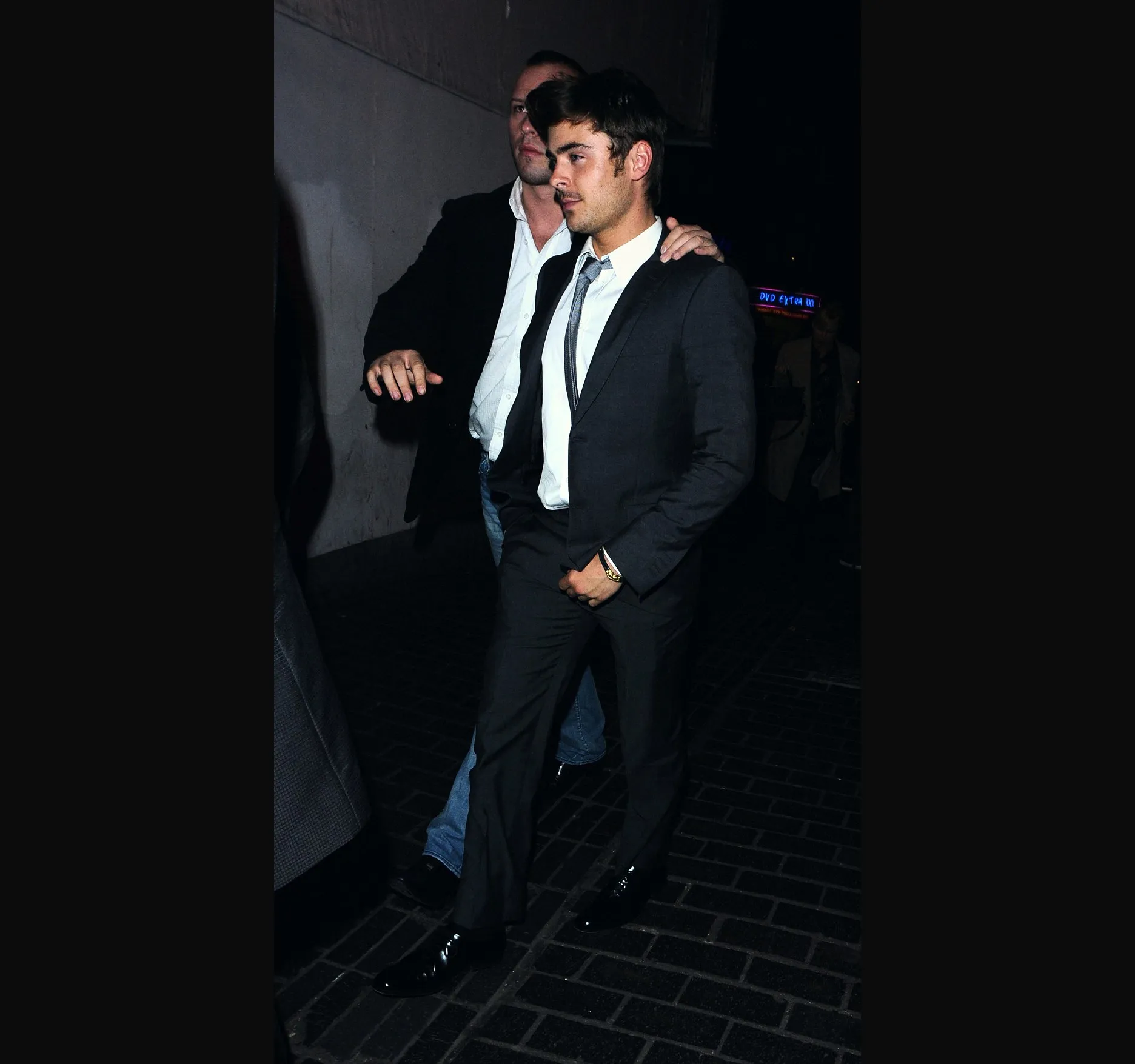The last frame, his head turned away and one hand tucked in front of him. Zac Efron turns 39 on 18 October 2026.